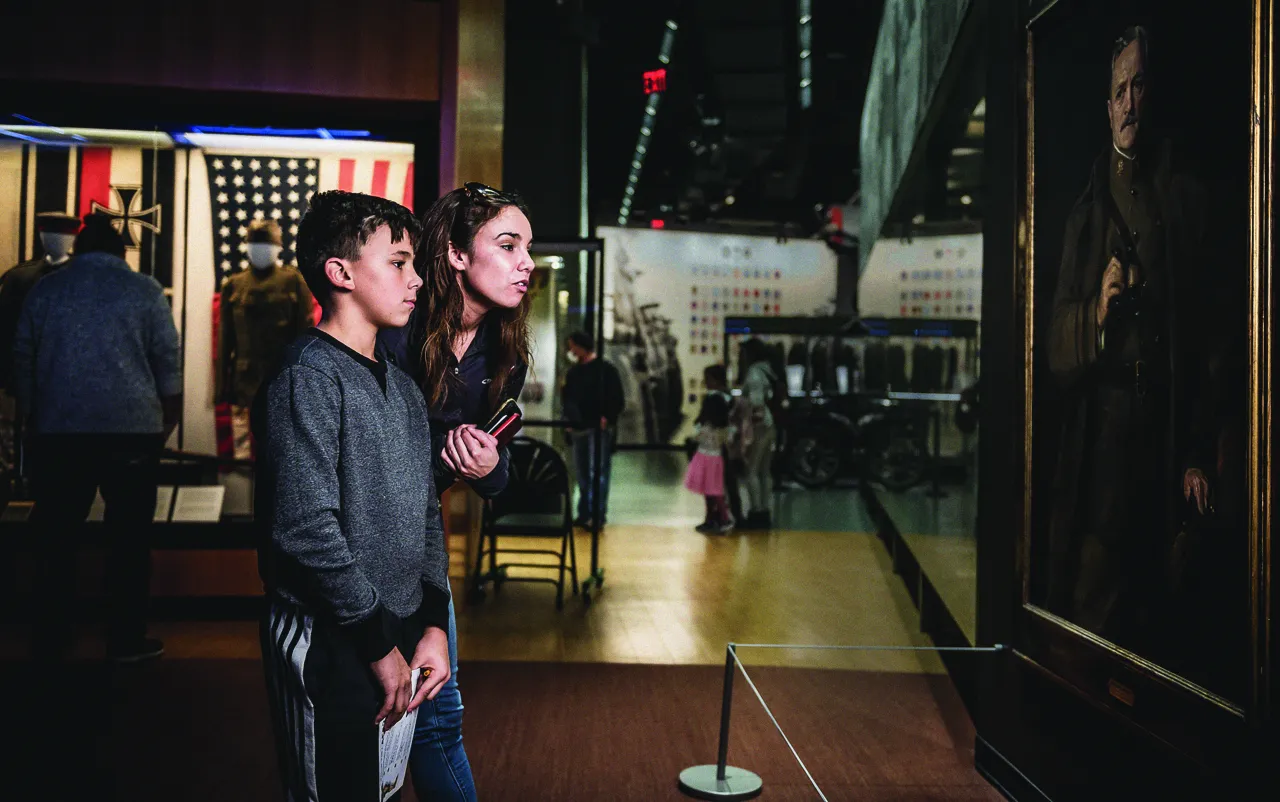 Visitors viewing a portrait inside the US National WWI Museum and Memorial