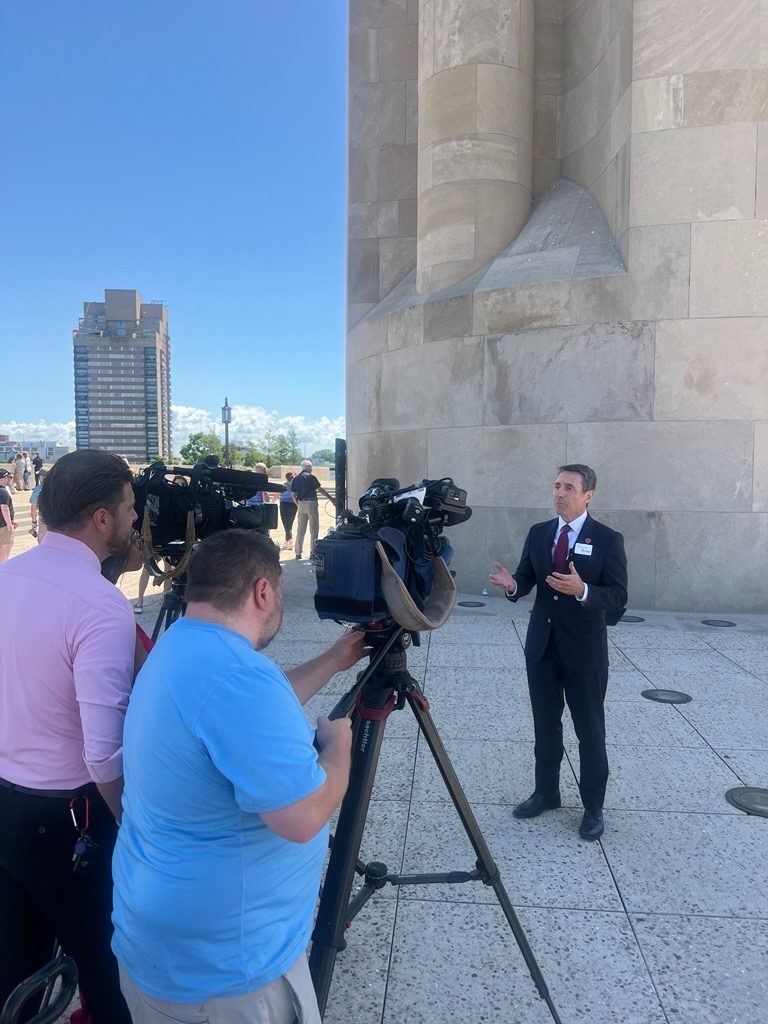 Matthew Naylor being interviewed by a television crew outside the US National WWI Museum and Memorial