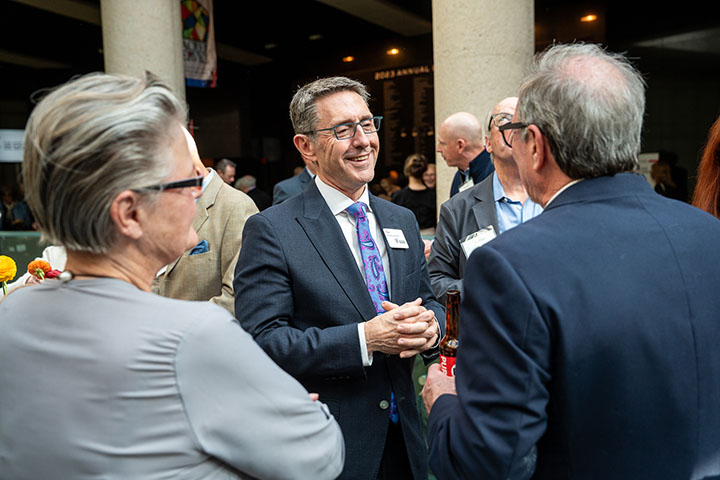 Matthew Naylor in conversation at an event